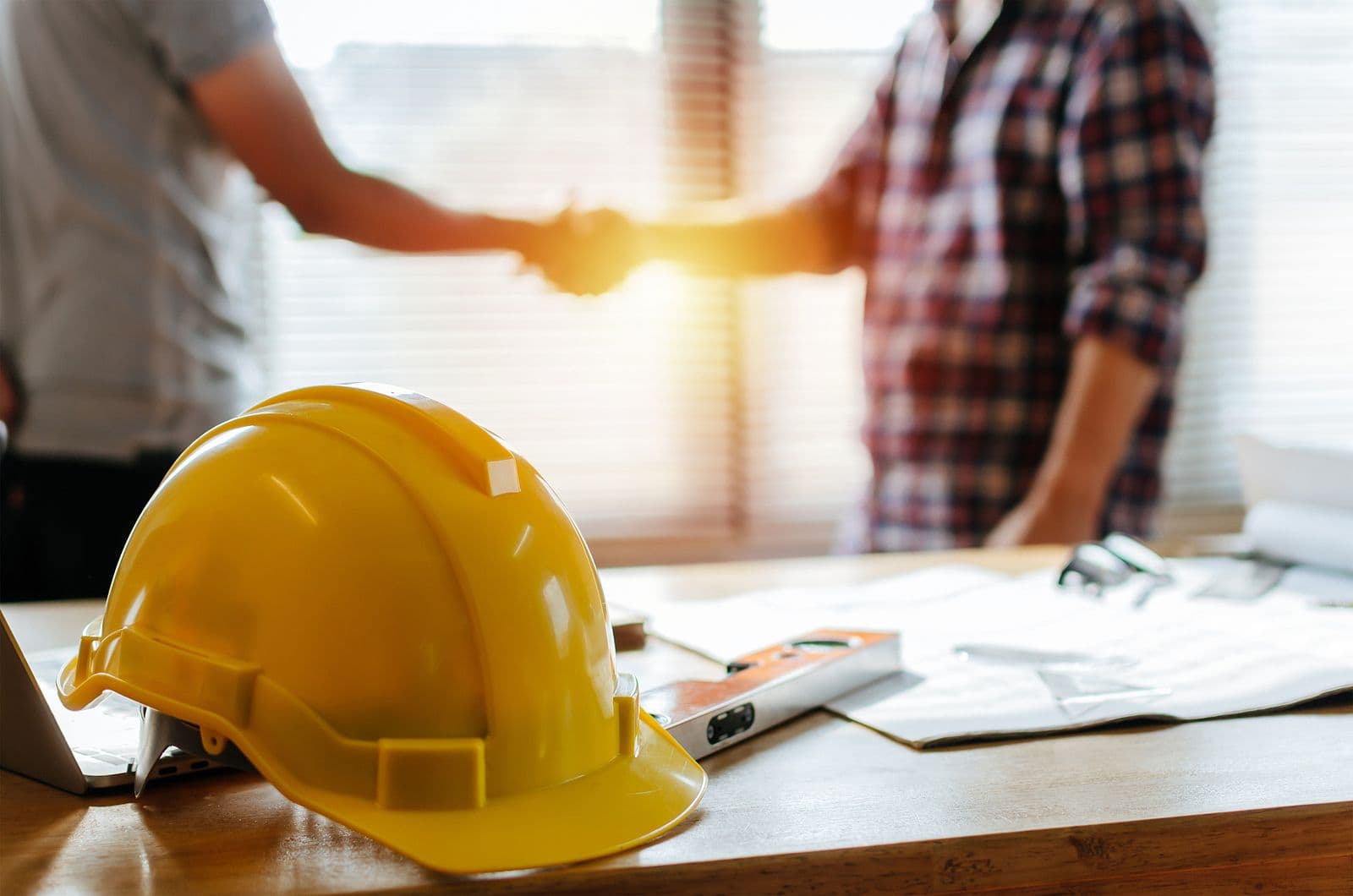 bigstock-Yellow-Safety-Helmet-On-Workpl-302933740.jpg