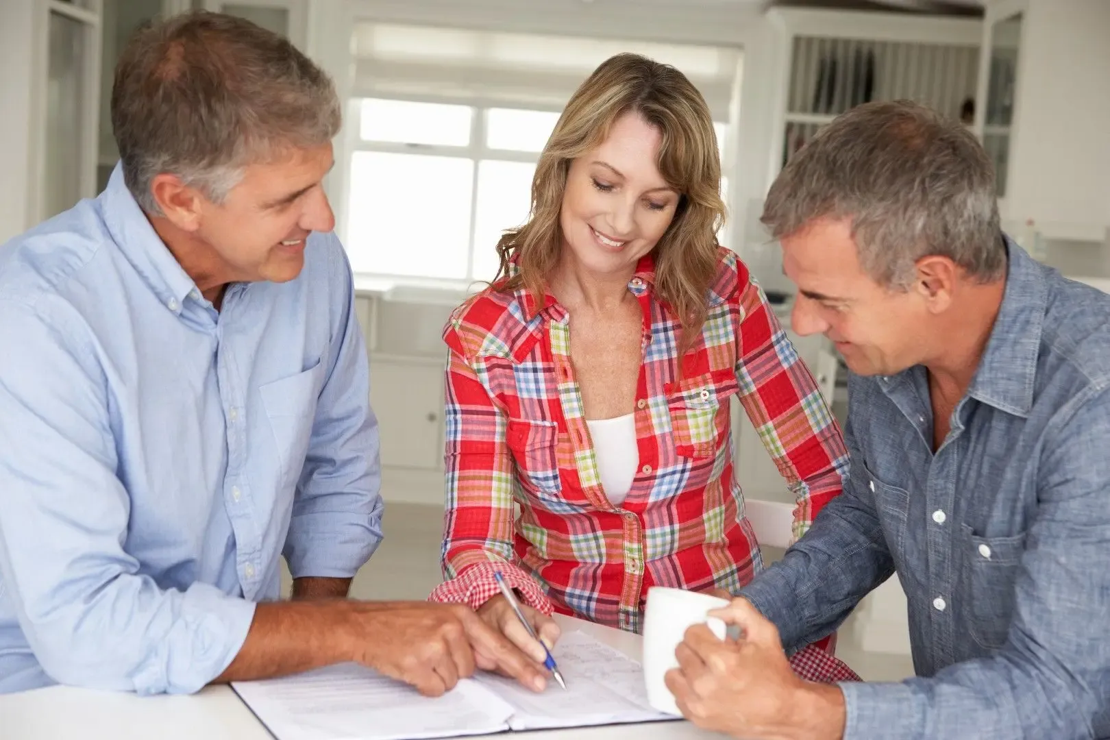 bigstock_mid_age_couple_with_financial__23244665__large__e8wmleeo6ntkvqolezuiha-1620x1080.webp